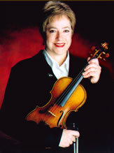 Kate Obrien holding a violin
