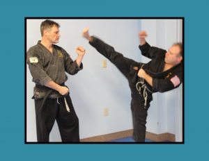 Tom and Bob Varasconi from Varasconi’s School of Self Defense: Branch of Hamzy’s in Bristol sparring on a teal background.