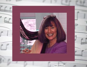 A smiling woman with a harp on a background of burgundy and music notes.