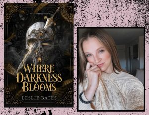 A photo of Author Leslie Bates with her book, Where Darkness Blooms.