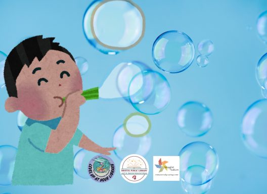 A boy blowing bubbles.